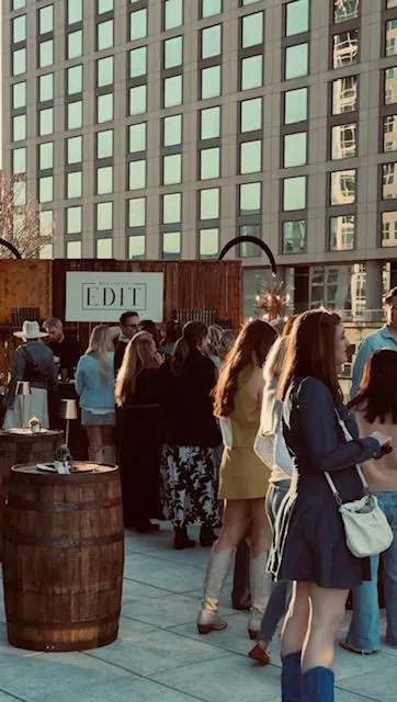 Buyers connecting with a label at an Edit circuit market