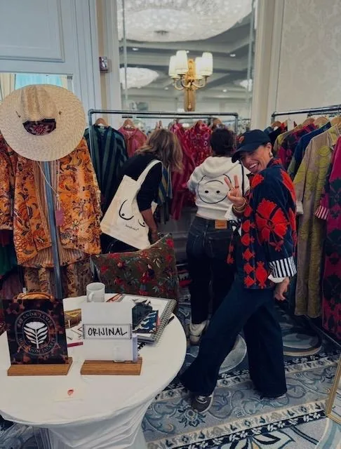 Retail buyers browsing the racks at a past Edit circuit market